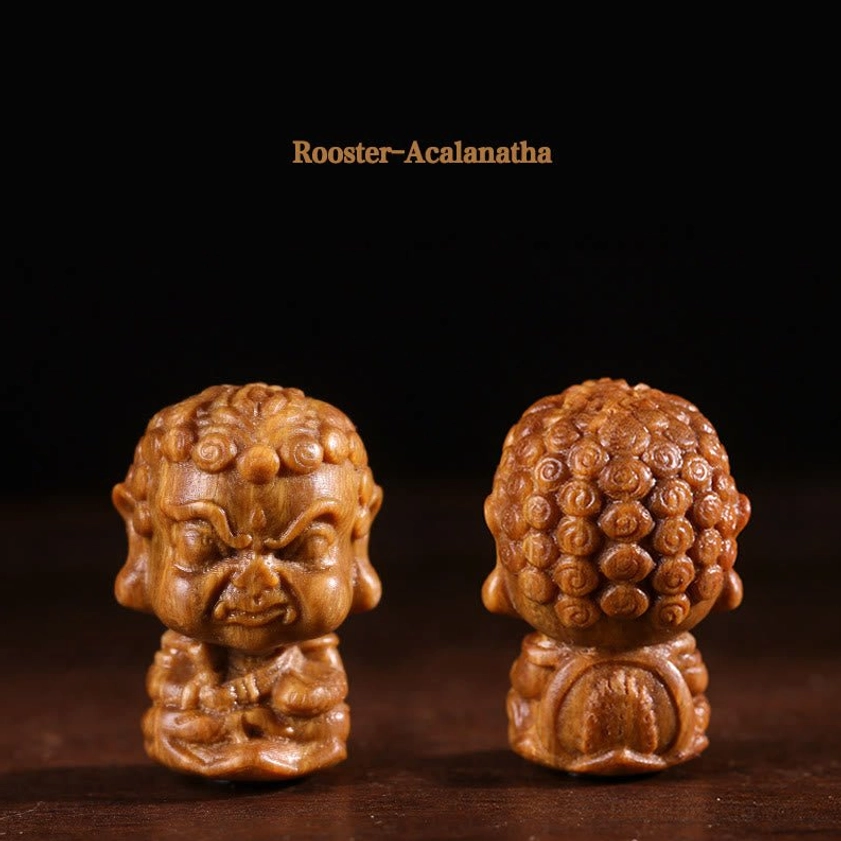 Rooster's patron Acalanatha Buddha hand-carved wooden statue displaying strong protective energy and intricate engravings