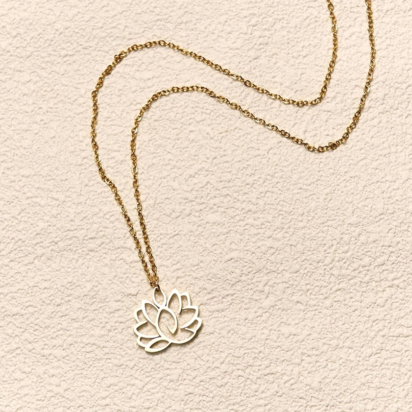 Rose gold lotus enlightenment necklace detail shot showcasing warm rose gold finish and hollow lotus pendant design