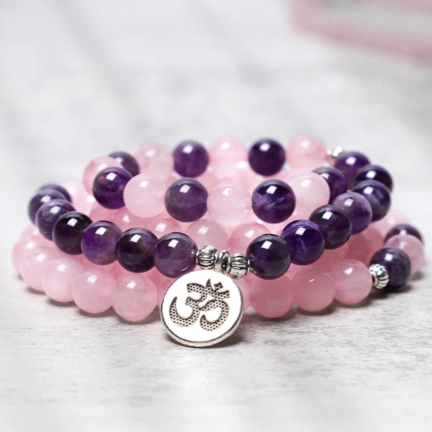 Rose quartz and amethyst mala bracelet with silver Om pendant for meditation and spiritual practice