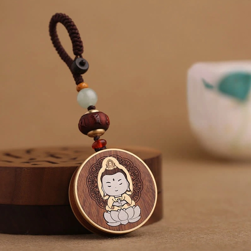 Rosewood Avalokitesvara keychain with sacred Buddhist iconography - career advancement charm