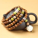 Rosewood lotus mala bracelet with white lotus pendant charm, 108 beads for Buddhist prayer and meditation