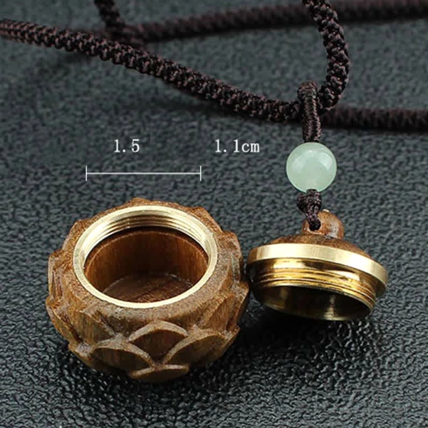 Round bottle-shaped green sandalwood Buddhist pendant with carved spiritual design and natural wood characteristics