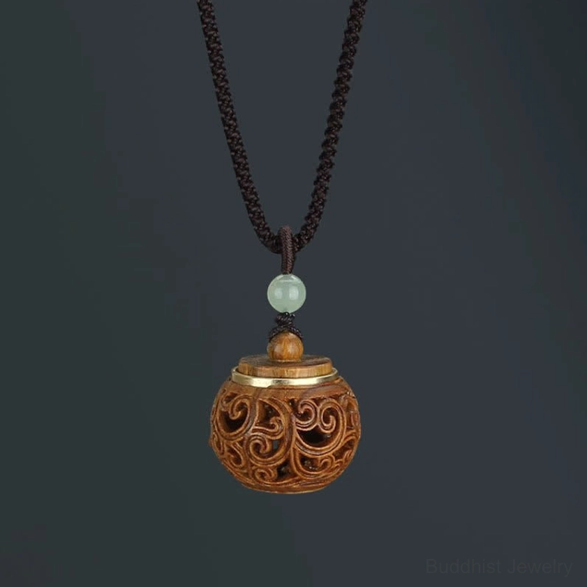 Round bottle-shaped green sandalwood Buddhist pendant necklace with hollow interior design for aromatherapy meditation practice
