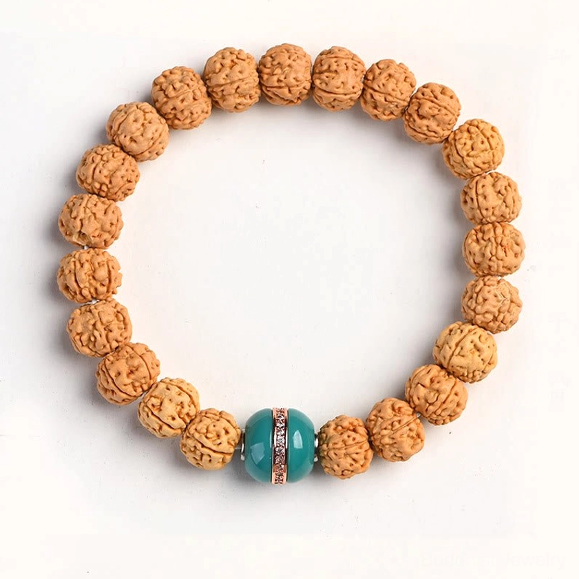 Rudraksha bodhi bracelet with liuli glass bead accent combining tradition and modern design