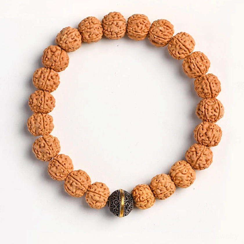 Single rudraksha bodhi seed bracelet top-down view with light brown seeds and central Tibetan silver bead