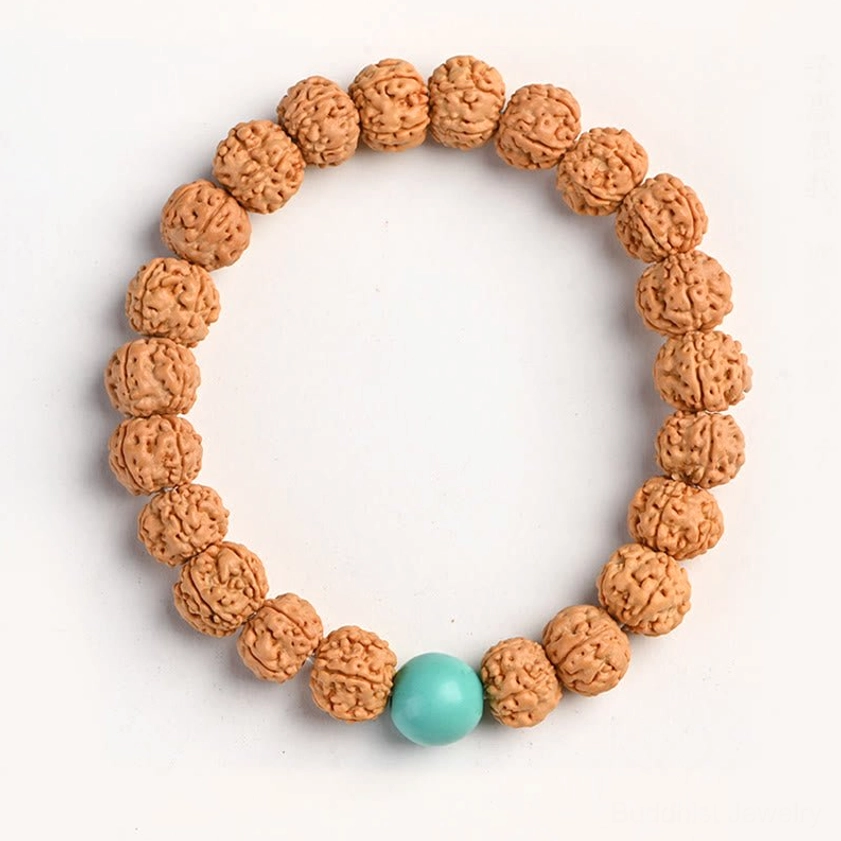 Rudraksha bodhi bracelet with turquoise accent bead and light brown natural seeds