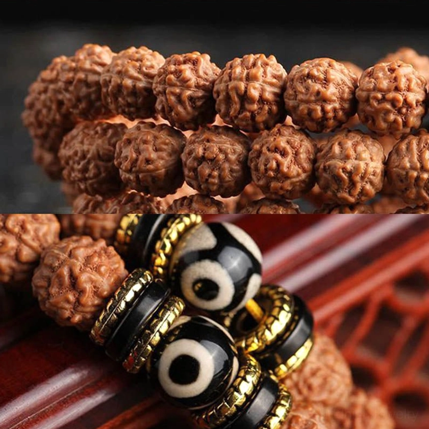 Rudraksha and Dzi Bead Mala Bracelet Showing Textured Brown Seeds with Gold Accents