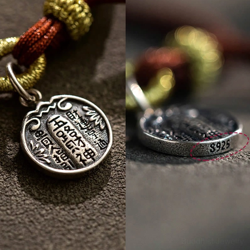 Magnified view of 925 stamped sterling silver Five Directions Wealth Gods charm with detailed engraving