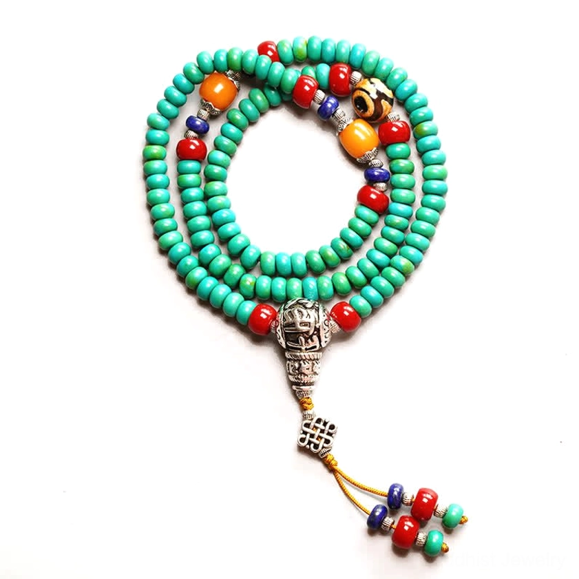 Sacred 108-bead Buddhist prayer mala with natural turquoise and decorative gemstone accents