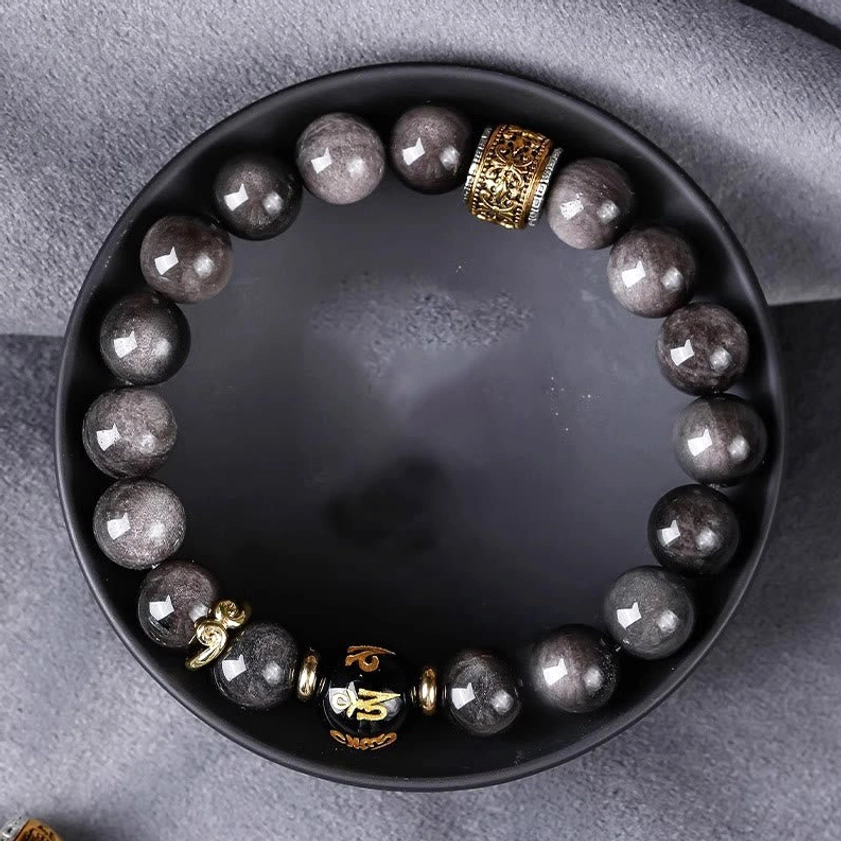 Artisan-crafted Buddhist bracelet with Silver Sheen Obsidian, Tiger's Eye, and sacred Om Mani Padme Hum metal charm for courage and compassion