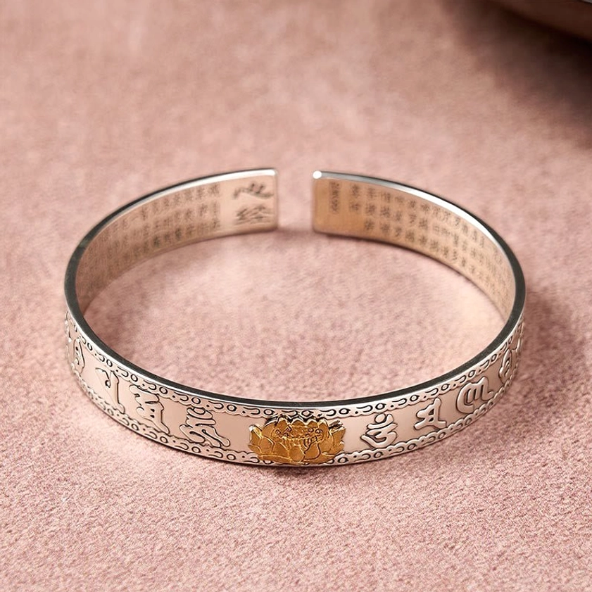 Sacred Buddhist silver bangle bracelet collection showing Pixiu, Dragon, and Lotus design variations