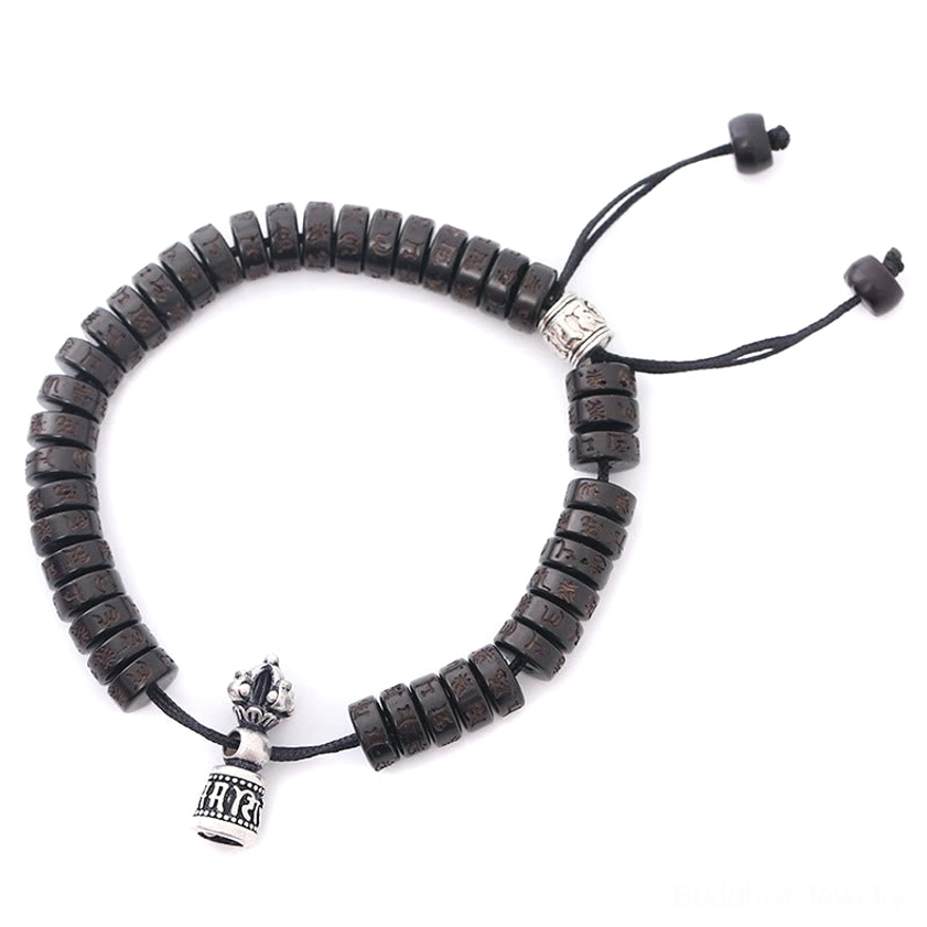 Tibetan Buddhist coconut shell bracelet with engraved silver charm and natural coconut beads