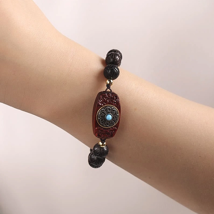 Sacred mantra bracelet collection showing different wood materials and natural variations