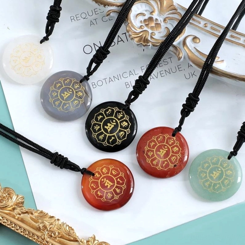 Sacred Buddhist Om Mani Padme Hum necklace pendant with natural crystal stone and spiritual significance