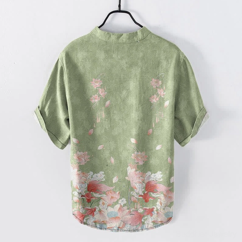 Sage green lotus print cotton men's short sleeve shirt back view with matching print and curved hem