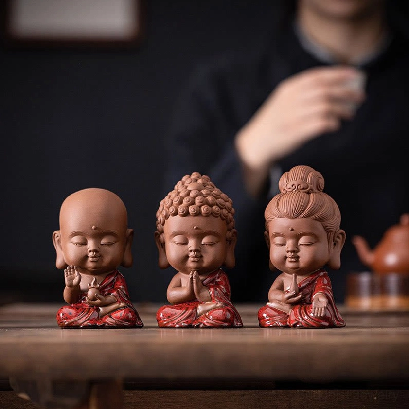 Buddhist Sakyamuni Buddha miniature ceramic figurine with prayer gesture symbolizing enlightenment wisdom and inner peace for daily meditation