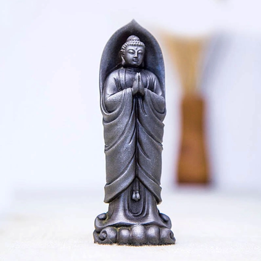 Sakyamuni Buddha Namaste iron powder resin statue positioned as Feng Shui home decor for prosperity and spiritual balance