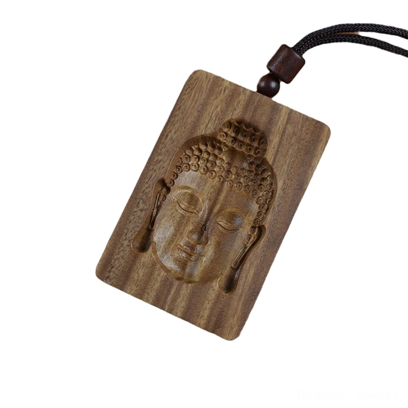 Green sandalwood Buddha necklace pendant featuring natural warm golden tones and spiritual Buddhist symbol carving on adjustable rope cord