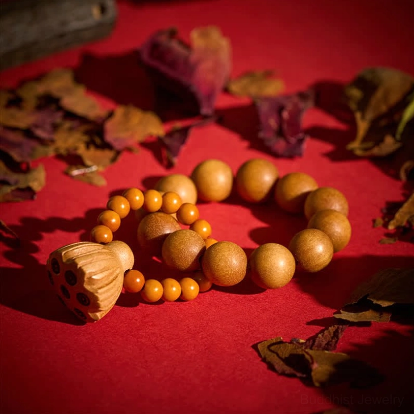Sandalwood lotus meditation palm beads full layout view showing complete bracelet, elastic string, polished wooden beads, and ornamental lotus charm