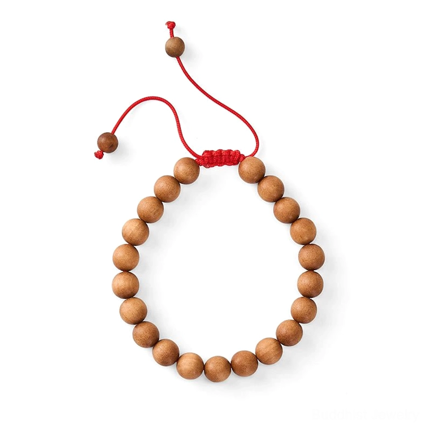 Buddhist sandalwood prayer mala bracelet lifestyle shot showing meditation and spiritual practice application