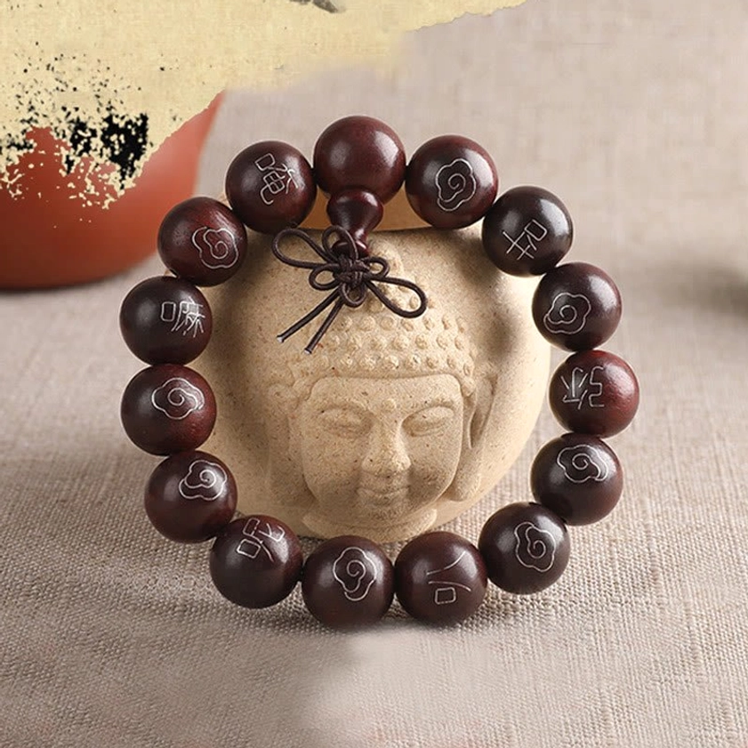 Red sandalwood mala bracelet with 925 sterling silver auspicious cloud motifs and sacred text inlays