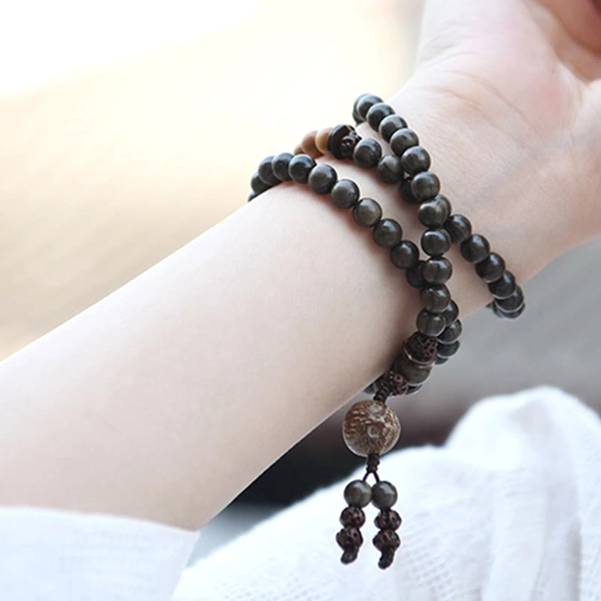 Sandalwood Buddhist prayer mala available in triple wrap style (14-15cm, 16cm, 17cm), 108 beads with natural wood tones and spiritual protection charm
