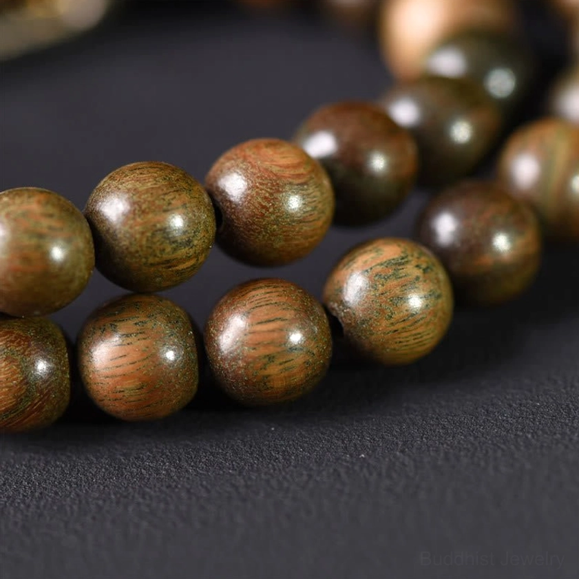 Green sandalwood and gold sheen obsidian bracelet for meditation, mindfulness, and spiritual balance practice