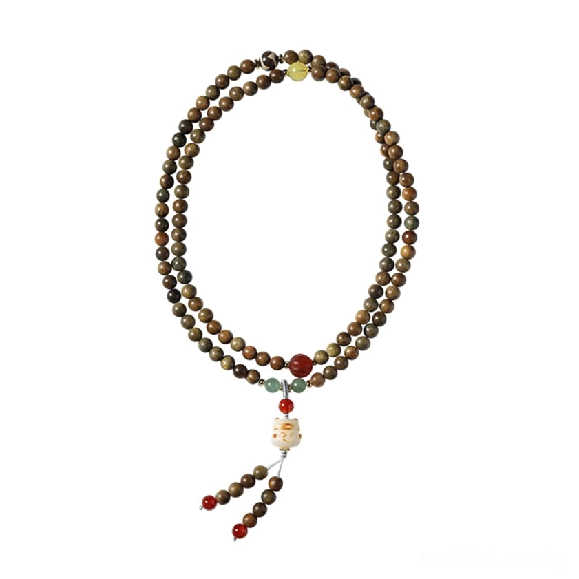 Minimalist sandalwood prayer bracelet with uniform brown wooden beads and small tassel pendant