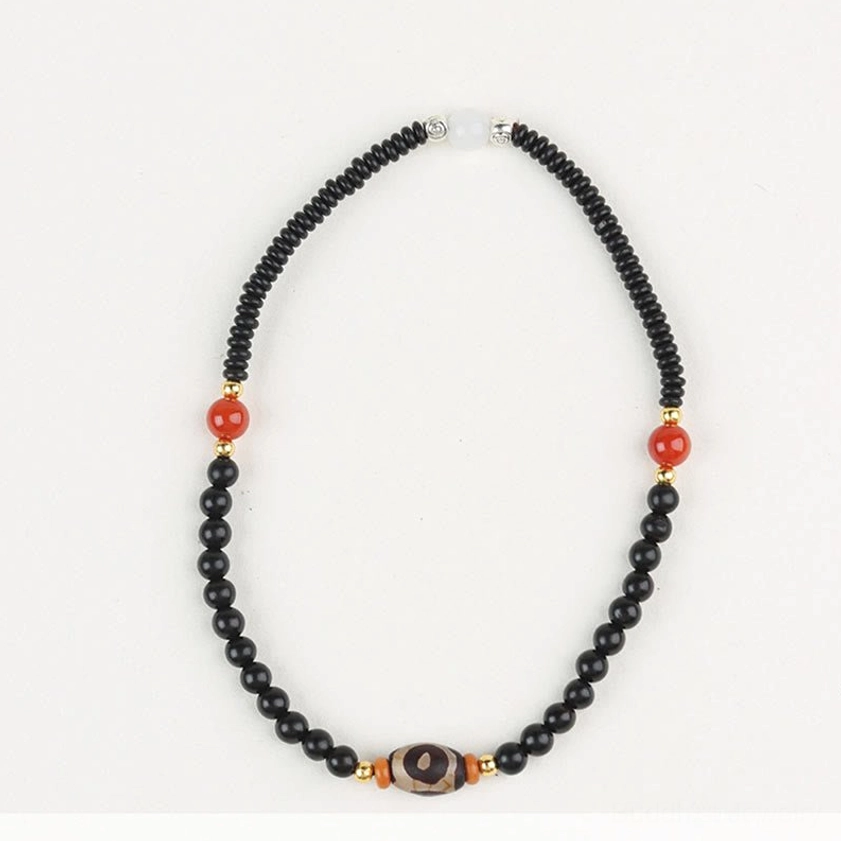 Sandalwood aromatic wood benefits guide highlighting calm, healing, purification, and spiritual properties in Buddhist meditation bracelet