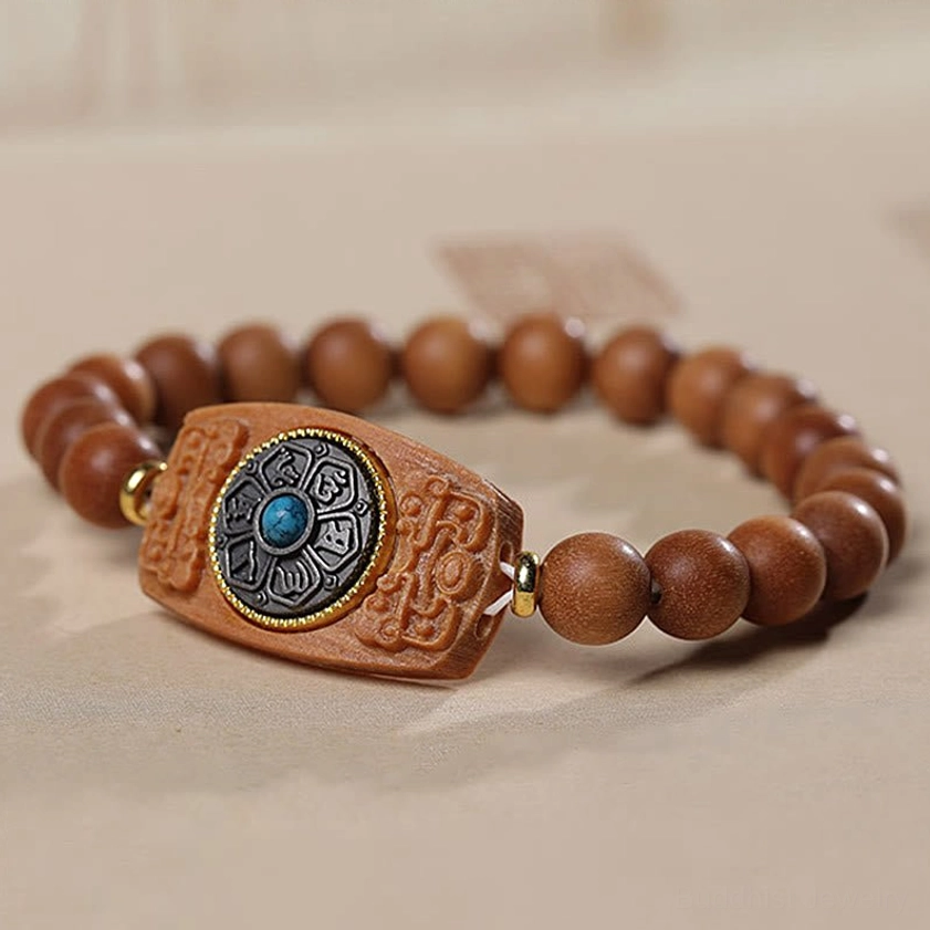 Green sandalwood and red sandalwood Buddhist bracelet comparison, showing natural wood color variation and grain