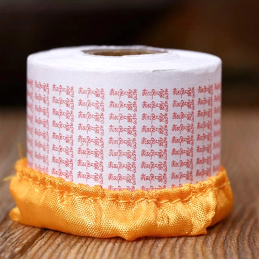 Sanskrit prayer paper roll with red Om Mani Padme Hum mantras, cloth storage cushion for Buddhist meditation practice
