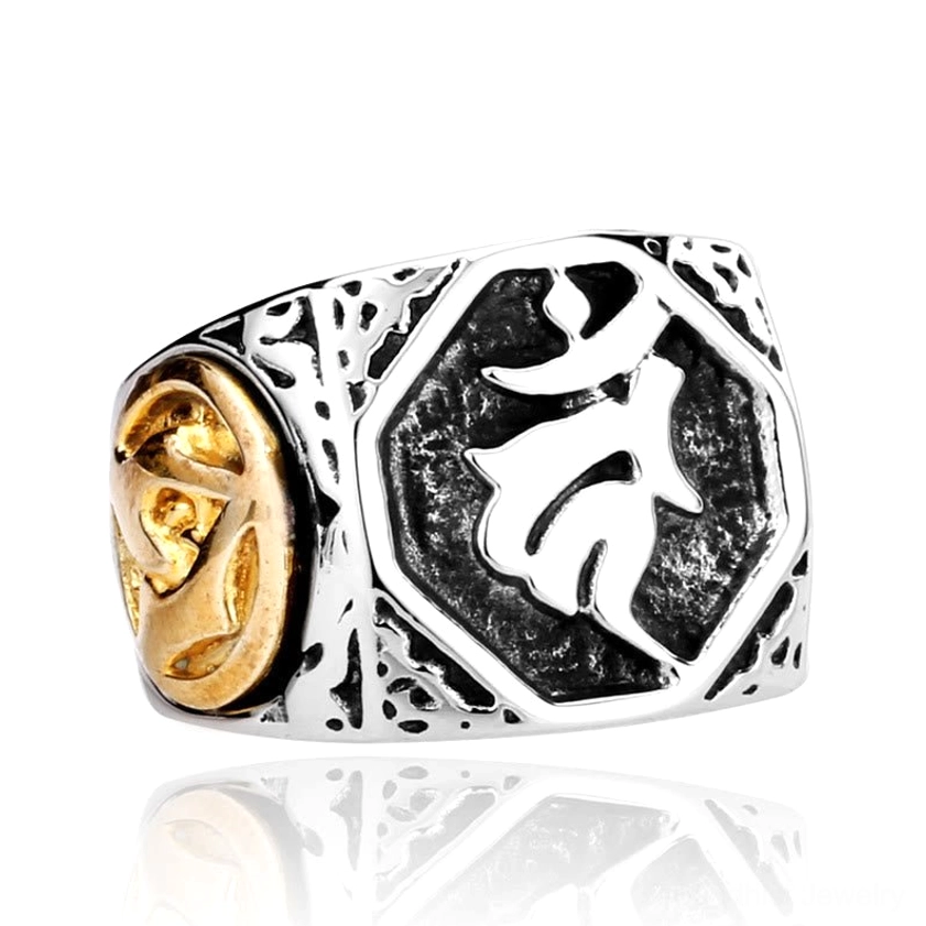 Buddhist protection ring top view displaying gold octagonal Sanskrit emblem on titanium steel band