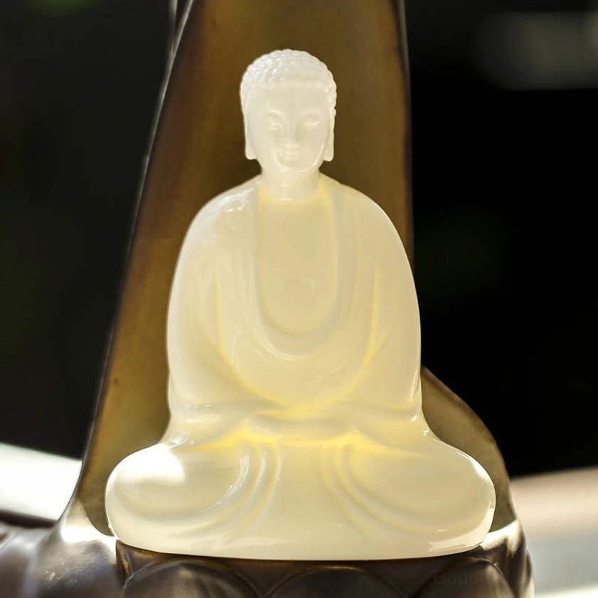 Seated Buddha Ceramic Night Light - Matte Off-white Meditation Buddha on Ceramic Base, Close-up Illuminated View