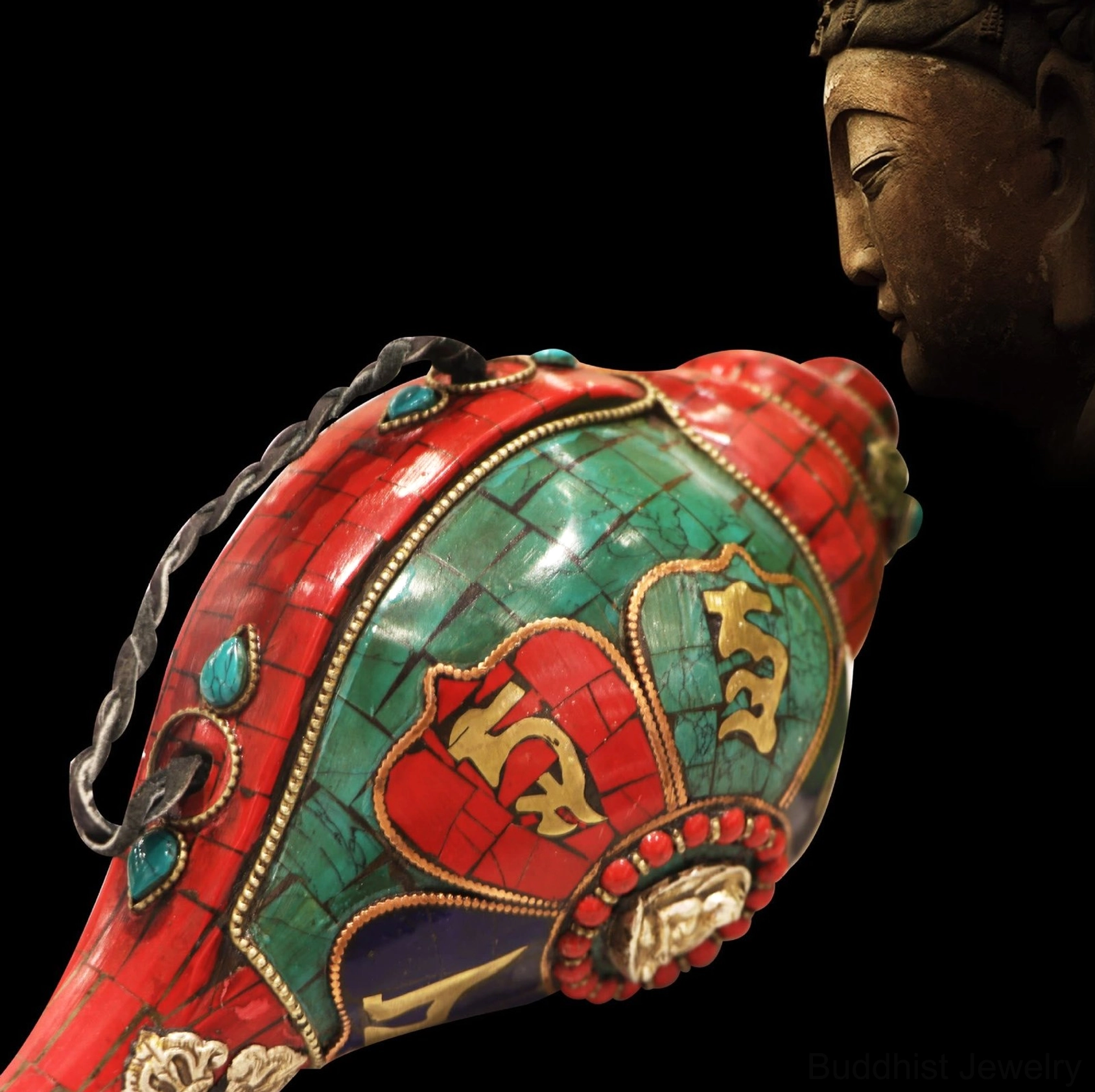 Braided hanging rope and turquoise gemstone accent on handmade Buddhist Shankha conch decoration