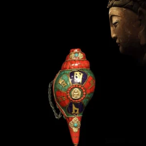 Handcrafted Shankha conch Buddha decoration with turquoise gems and gold Sanskrit Om Mani Padme Hum mantras left side view