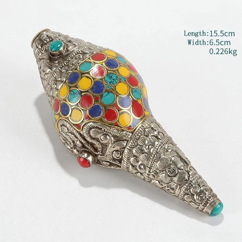 Flat lay side view of Buddhist shankha conch shell with multicolor circular enamel inlays and measurement specifications