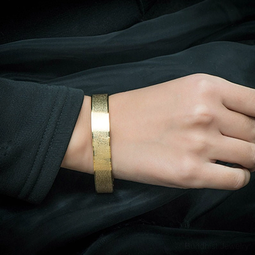 Shurangama Mantra titanium steel bracelet side view on wrist demonstrating slim band and fit