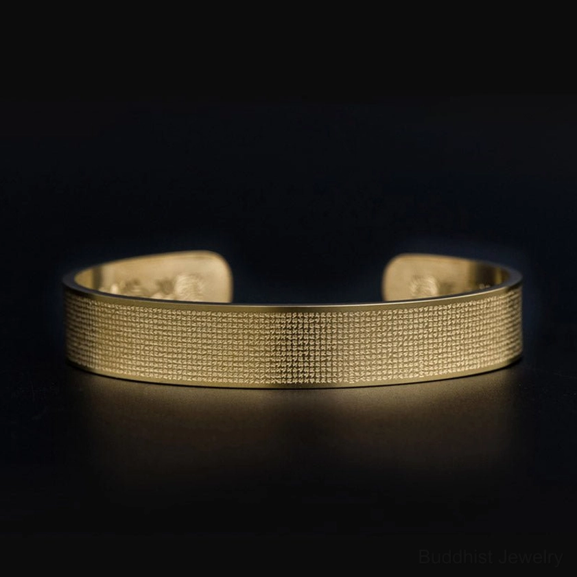 Gold Shurangama Mantra titanium steel open cuff bracelet front view with full engraved Sanskrit text