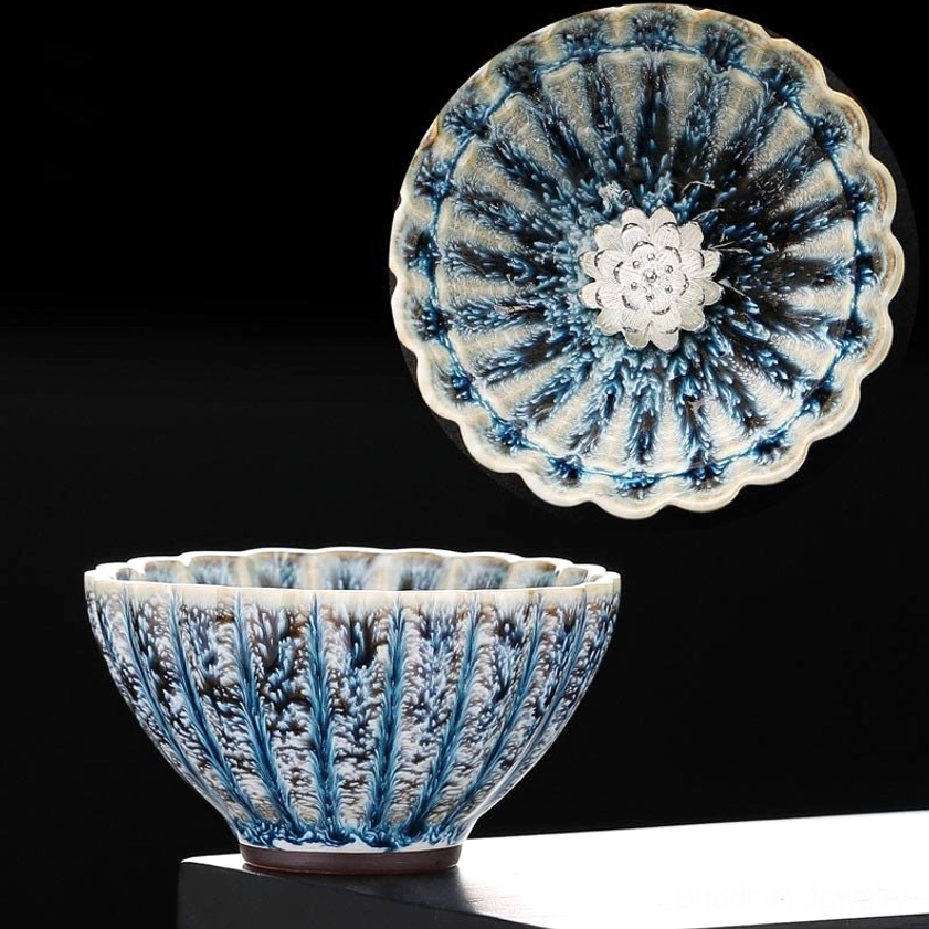 Silver lotus jian zhan ceramic tea cup with fluted petal design and white silver inlay