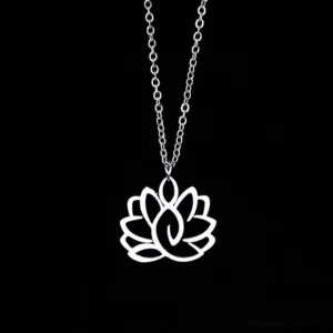 Hollow lotus enlightenment necklace in silver stainless steel, front top-down view on black background showcasing the carved lotus pendant design