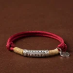 999 sterling silver Om Mani Padme Hum mantra tube with Fu character charm handmade braided bracelet red and black rope