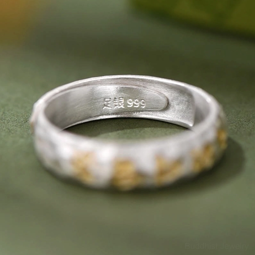 Inner band close-up of 999 sterling silver mantra ring showing Zu Yin 999 authenticity stamp and hammered detail