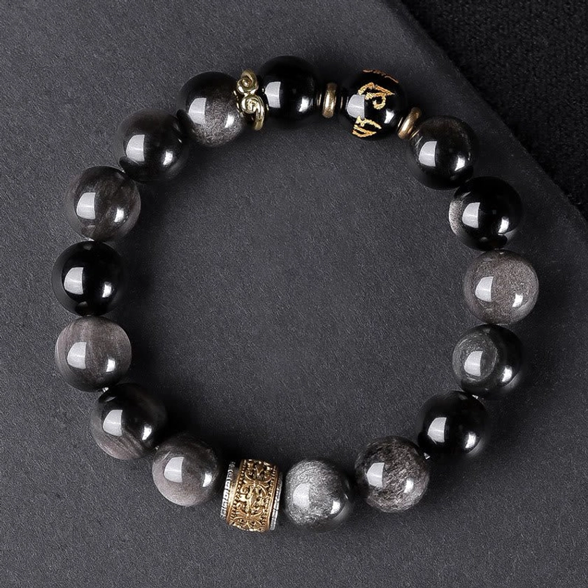 Silver Sheen Obsidian beaded bracelet showcasing smooth stone texture and protective properties for meditation and spiritual practice