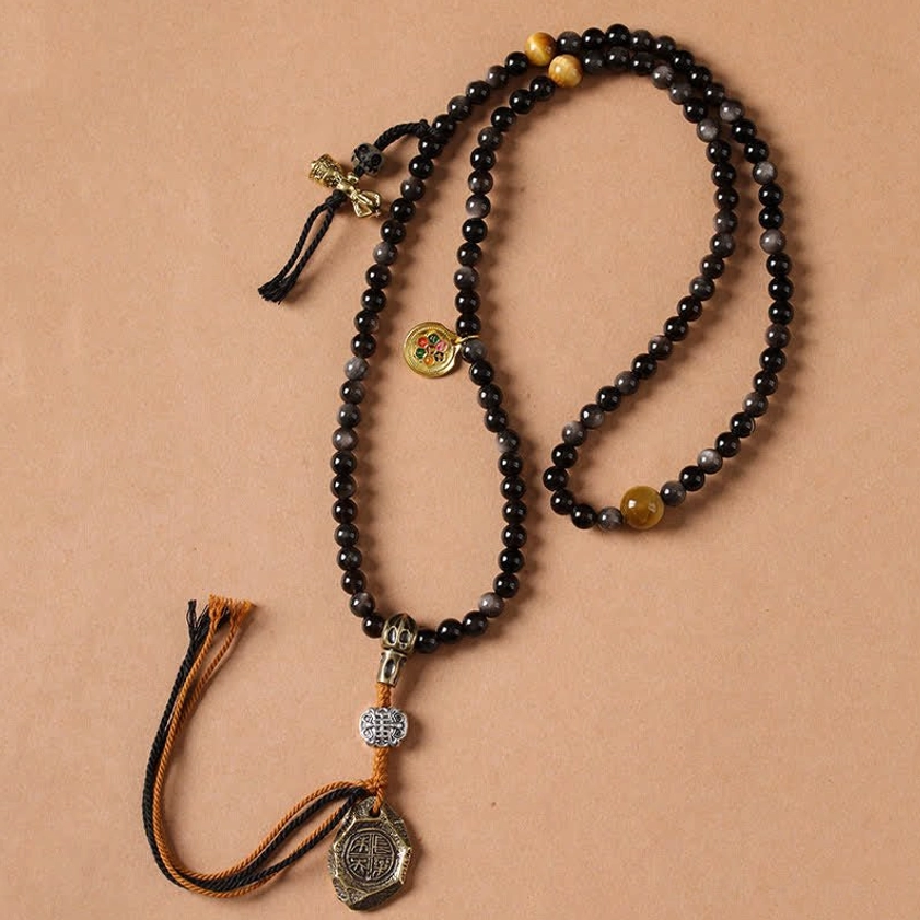 Single Silver Sheen Obsidian Garuda mala necklace with protection pendant and tiger eye stone accents