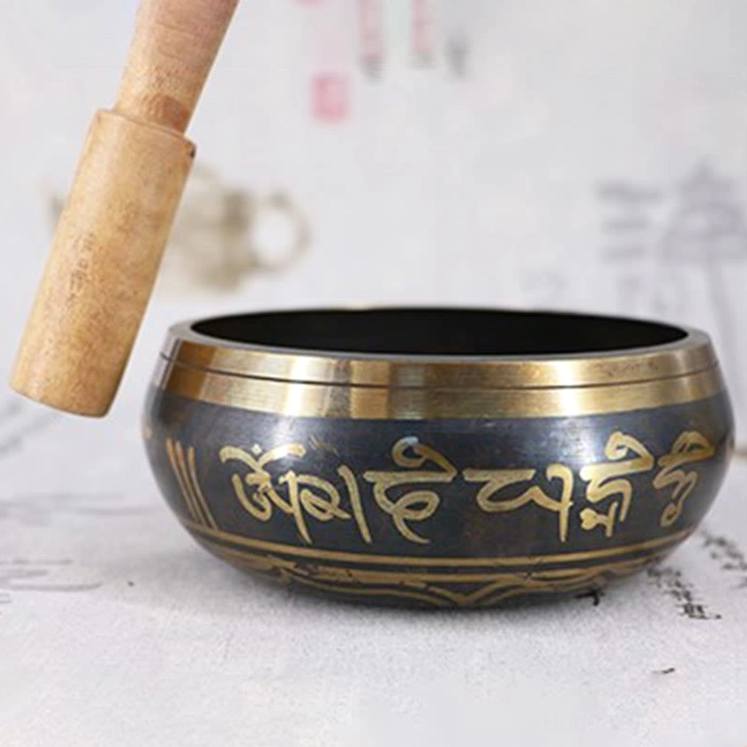 Buddhist meditation singing bowl ceramic cushion display showing comfortable resting position and meditation bowl stability setup