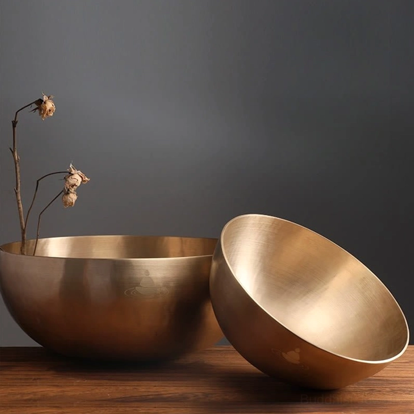 Handcrafted copper singing bowl in studio lighting, highlighting warm golden tones and premium material quality