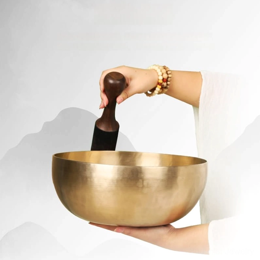 Multiple handmade singing bowls displayed together showing various sizes for different meditation and healing purposes