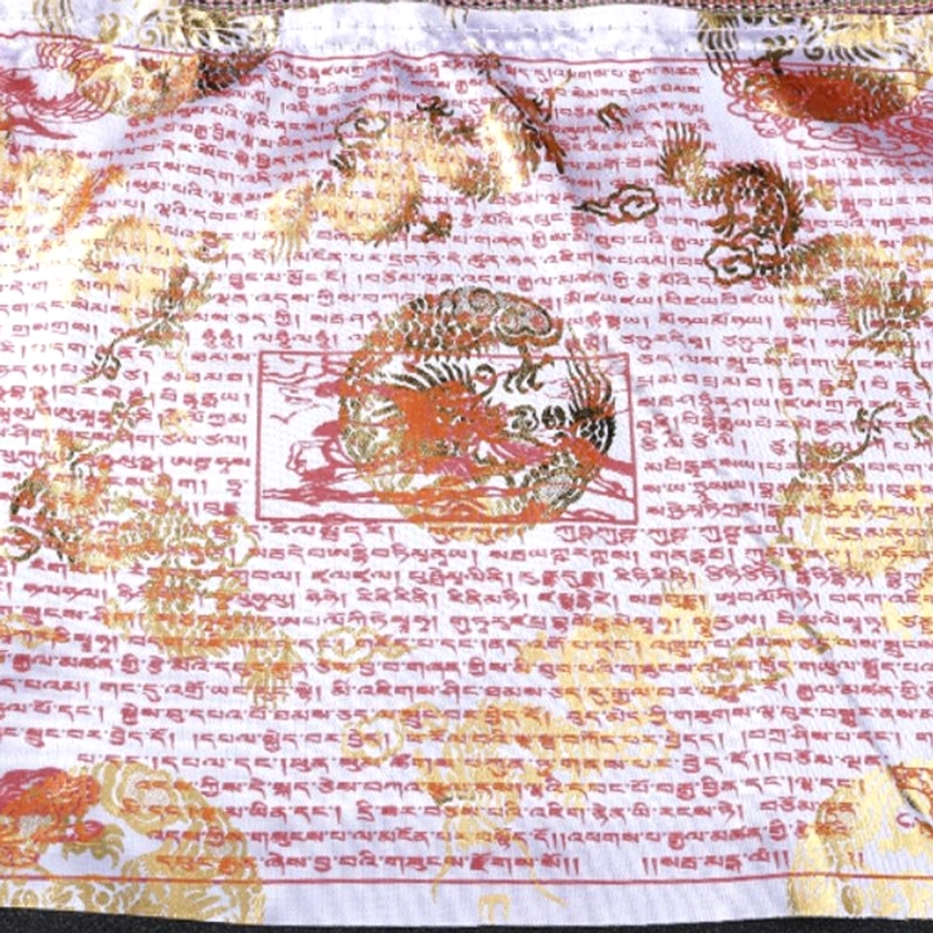 Single light pink Buddhist prayer flag with gold foil traditional Buddhist patterns and Tibetan script printed