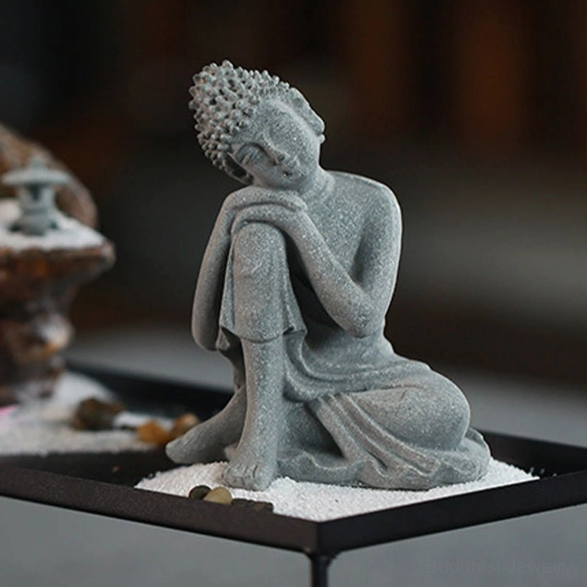 Sitting Buddha stone statue representing enlightenment and spiritual awakening, decorative piece for mindful living