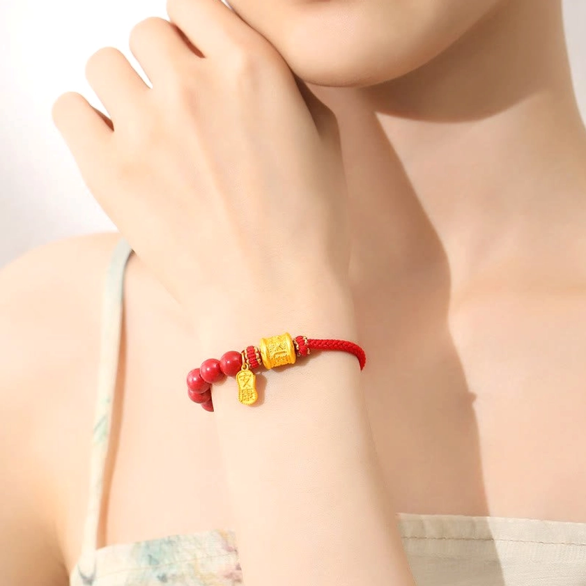 Female model wearing Om Mani Padme Hum protective bracelet on wrist - lifestyle portrait